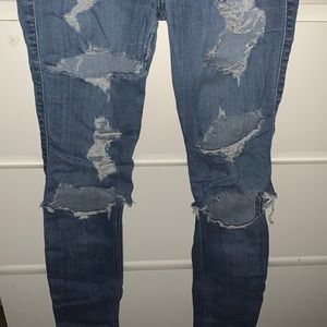 Hollister ripped skinny jeans.